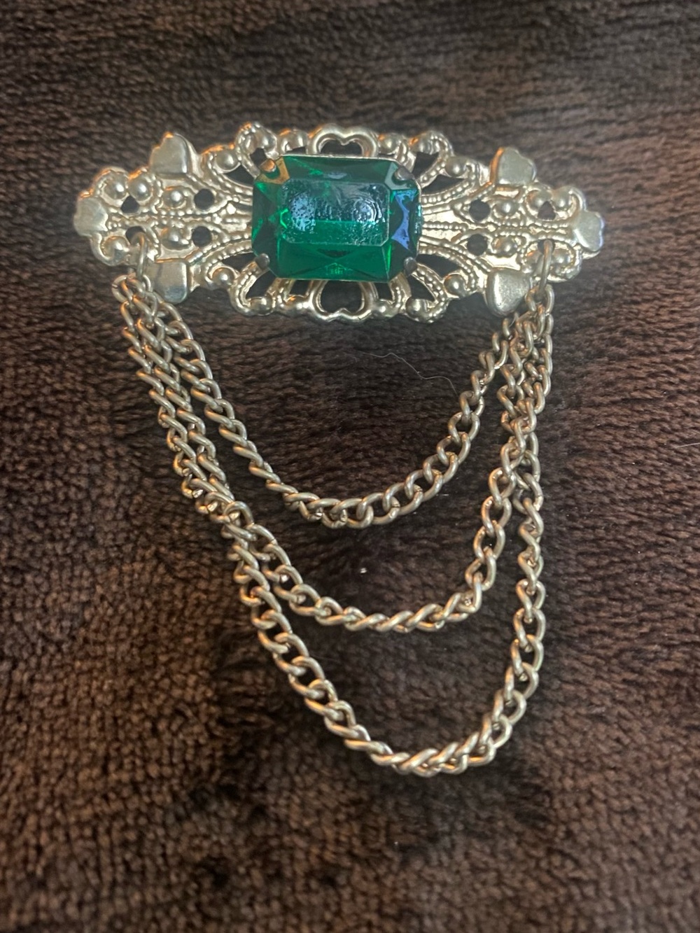 Vintage-Inspired Silver Brooch with Emerald Green Stone and Draped Chains